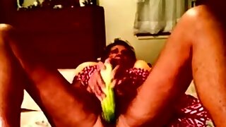Granny amateur using a huge cucumber,..